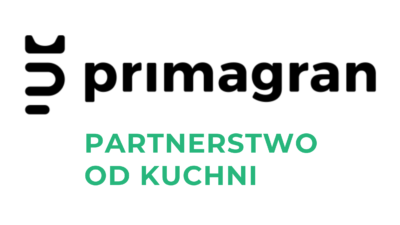 alt="logo marki Primagran z hasłem „Partnerstwo od kuchni” na białym tle. Czarne logotyp i sygnet zestawiono z zielonym napisem podkreślającym współpracę z projektantami wnętrz."